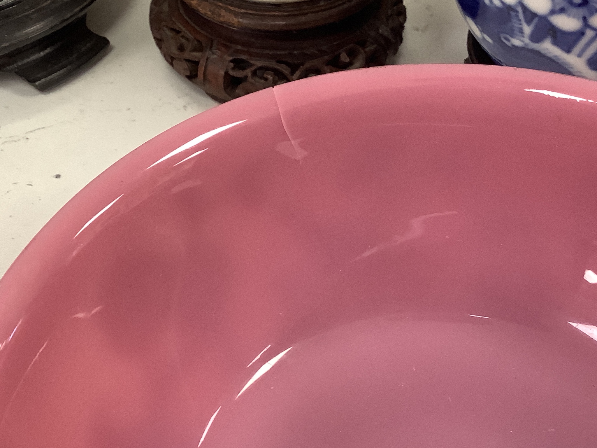 A Chinese Beijing pink glass bowl - cracked